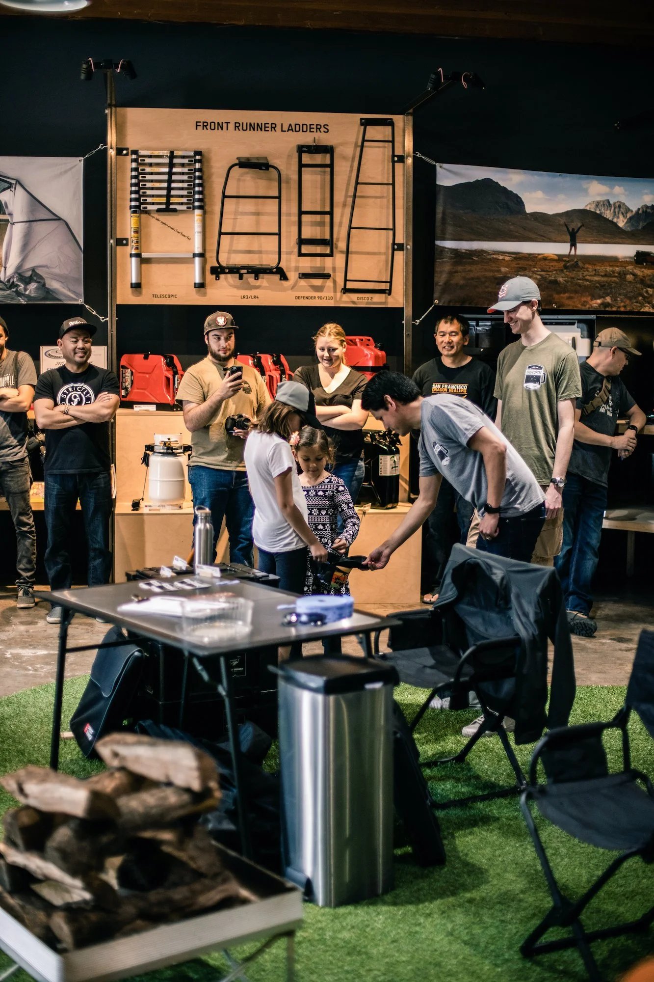 Rigs and Coffee community members gathered at a gear shop meetup