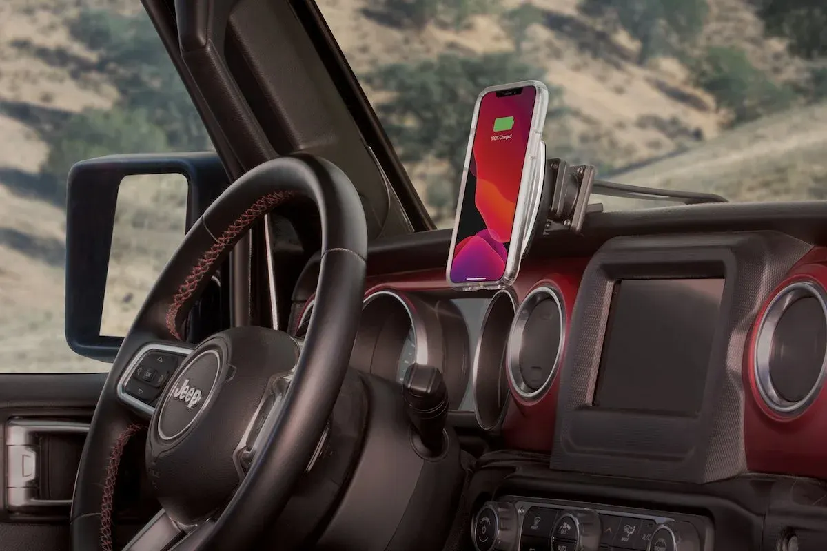 Phone in a Scosche mount on a Jeep dashboard
