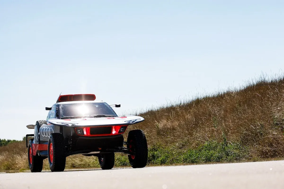 Audi RS Q e-tron E2 driving on a road in daylight
