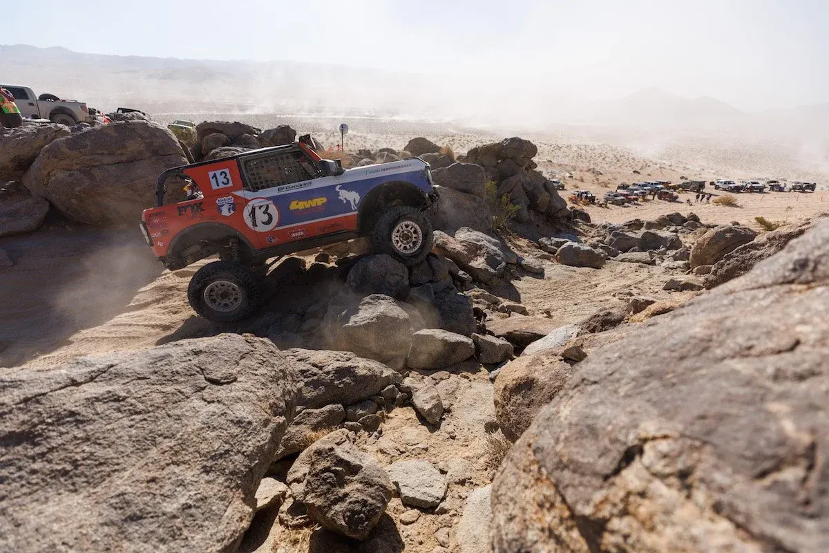 Ford Bronco race truck climbing rocks at King of the Hammers