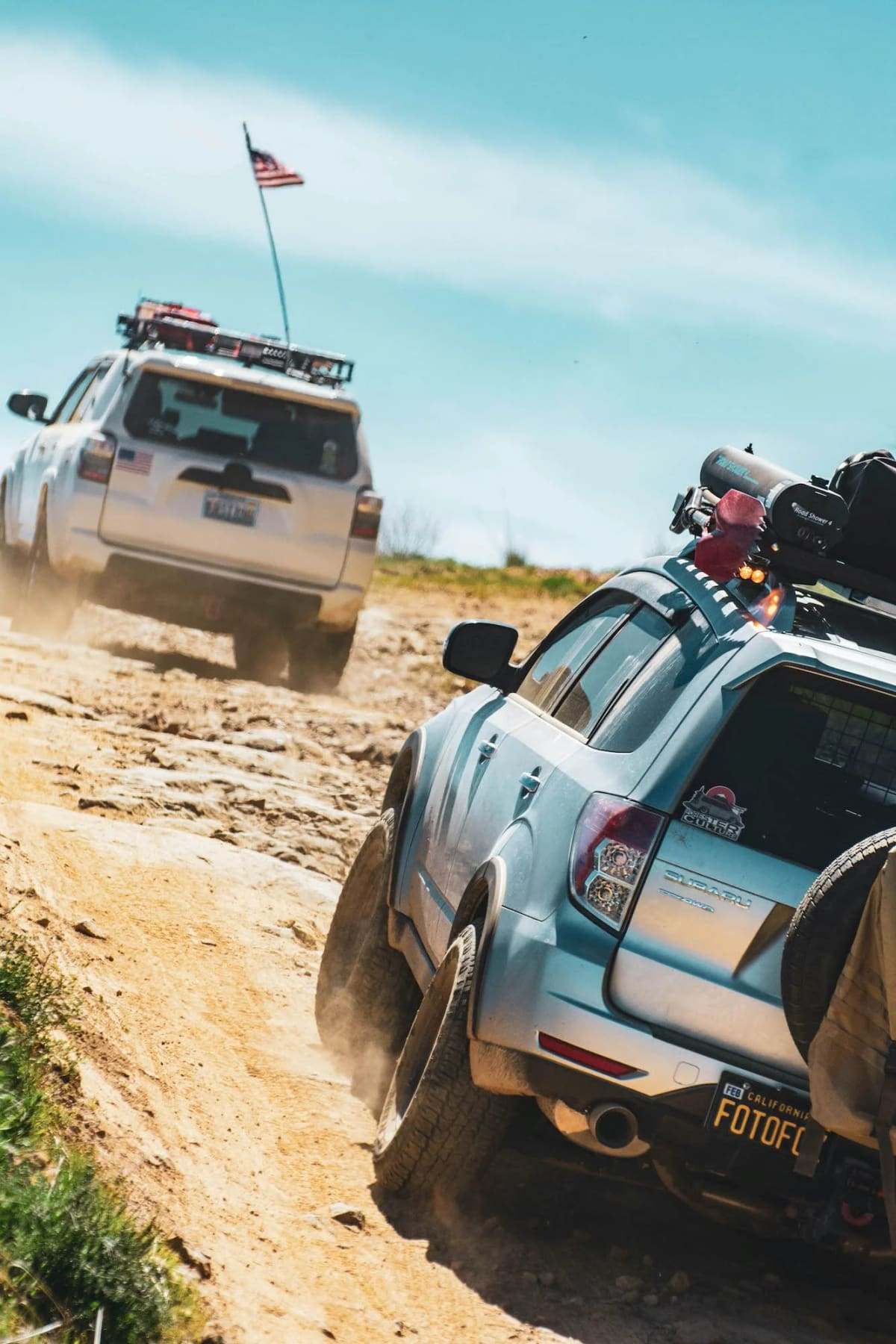 Overland Toyota 4Runner and Subaru Forester Climbing a Hill